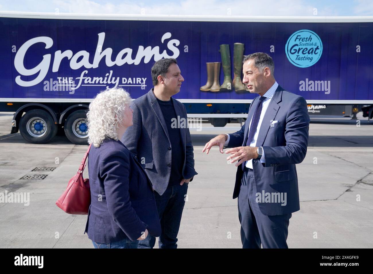 Scottish Labour leader Anas Sarwar chats with Robert Graham from Graham's The Family Dairy Dairy during a visit to the dairy in Bridge of Allan. Picture date: Friday May 3, 2024. Stock Photo