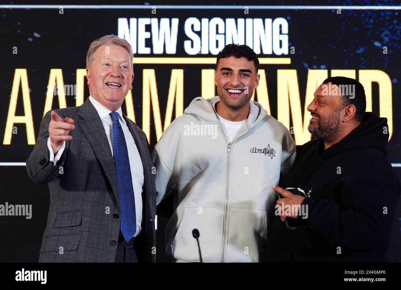 Promoter Frank Warren (left) with Aadam Hamed alongside his father and former boxer, Naseem Hamed (right) following a press conference at Glaziers Hall, London. Picture date: Friday May 3, 2024. Stock Photo