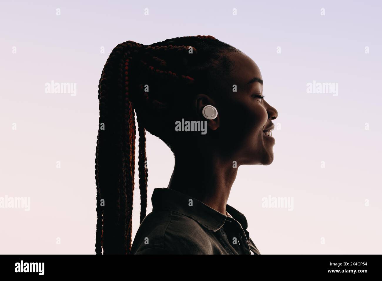 Happy black woman listens hi res stock photography and images Alamy