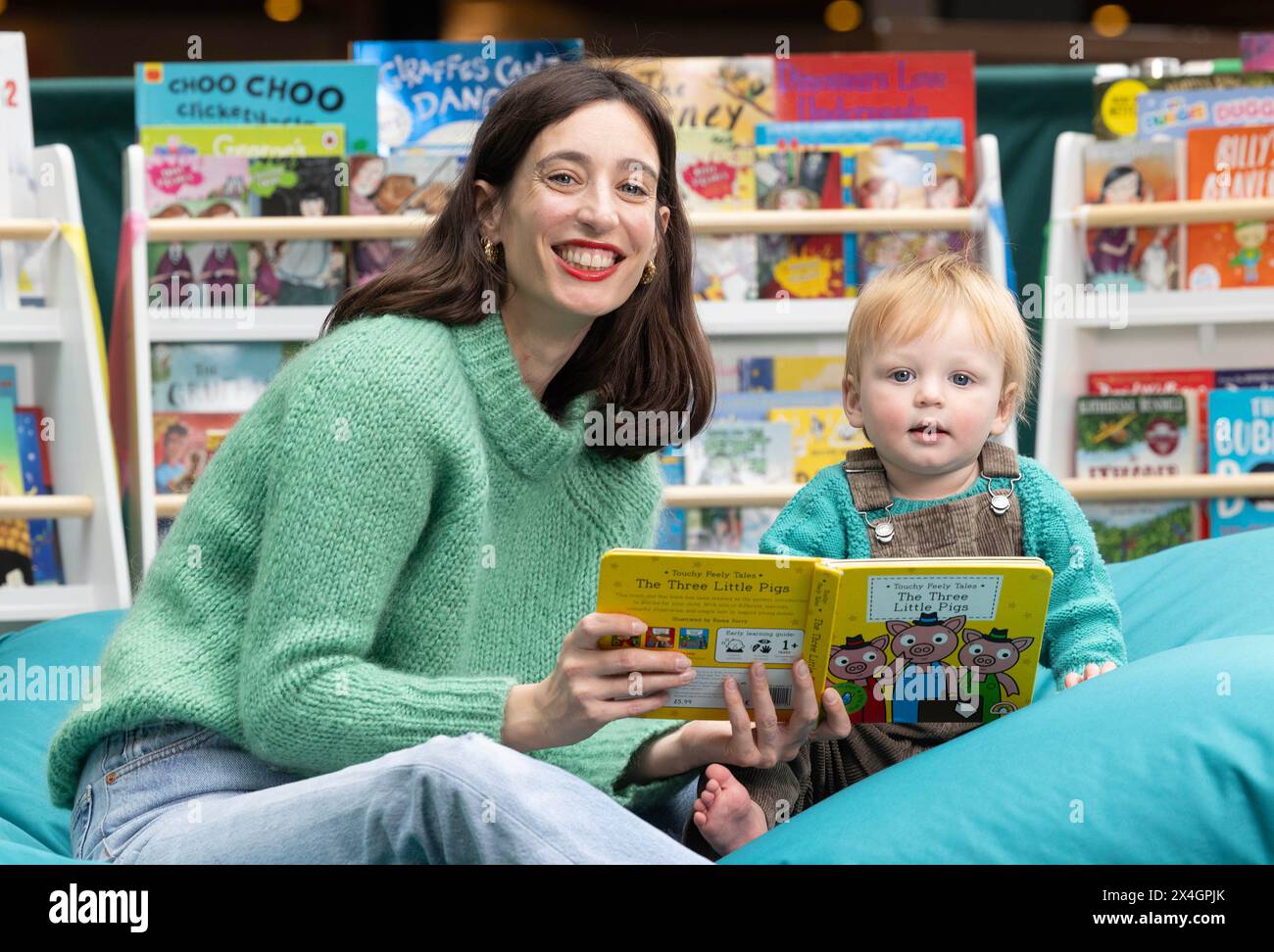 EDITORIAL USE ONLY Television presenter Laura Jackson with her son Nico aged 1 as she donates her used children's clothes and books at the launch of Westfield's Good Festival, which is an event that aims to showcase brand led sustainability initiatives, Stratford. Picture date: Friday May 3, 2024. Stock Photo