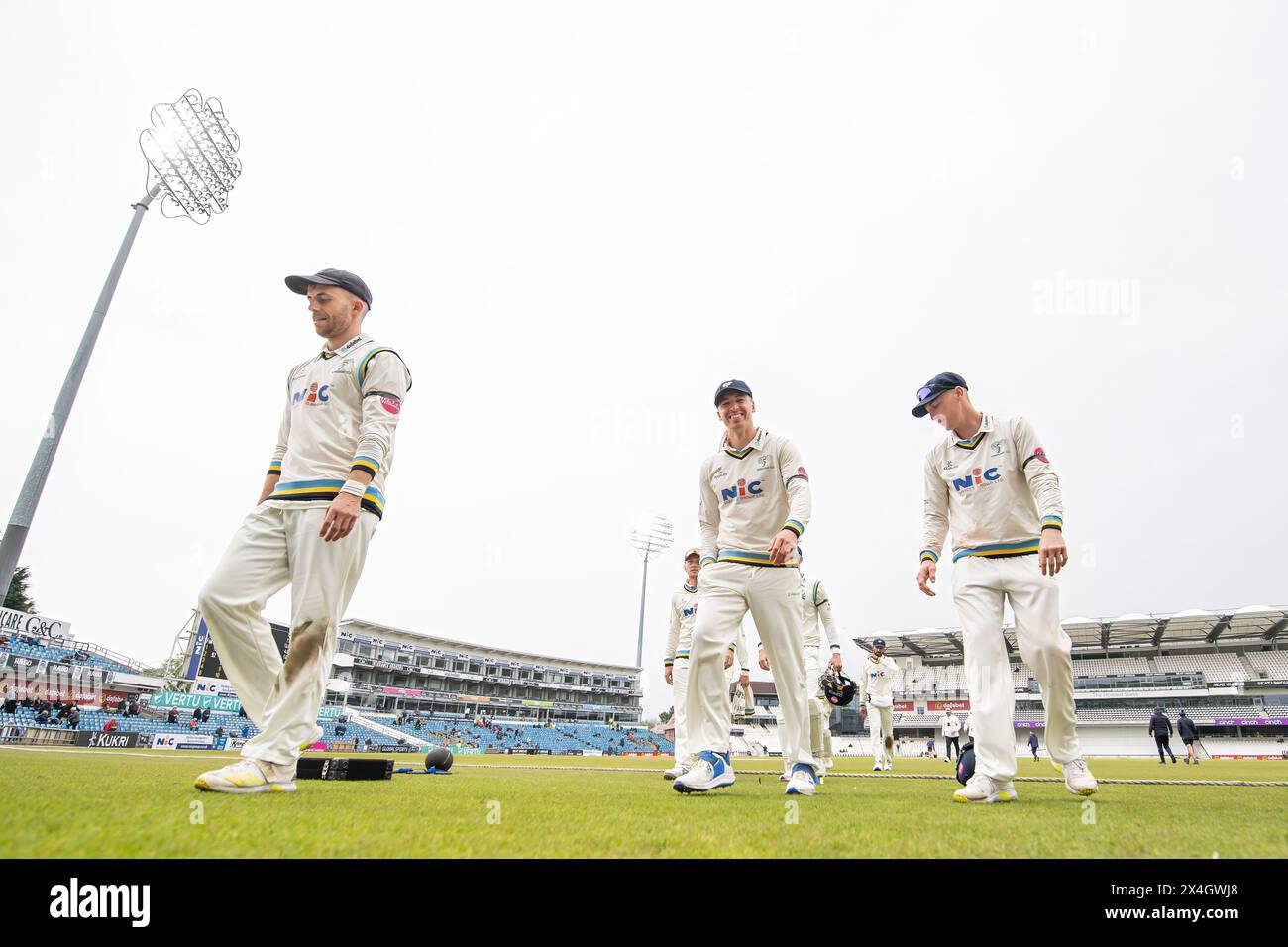 Yorkshire leave the field at the end of the morning session during the Vitality County Championship Division 2 match Yorkshire vs Glamorgan at Headingley Cricket Ground, Leeds, United Kingdom, 3rd May 2024  (Photo by Craig Thomas/News Images) Stock Photo