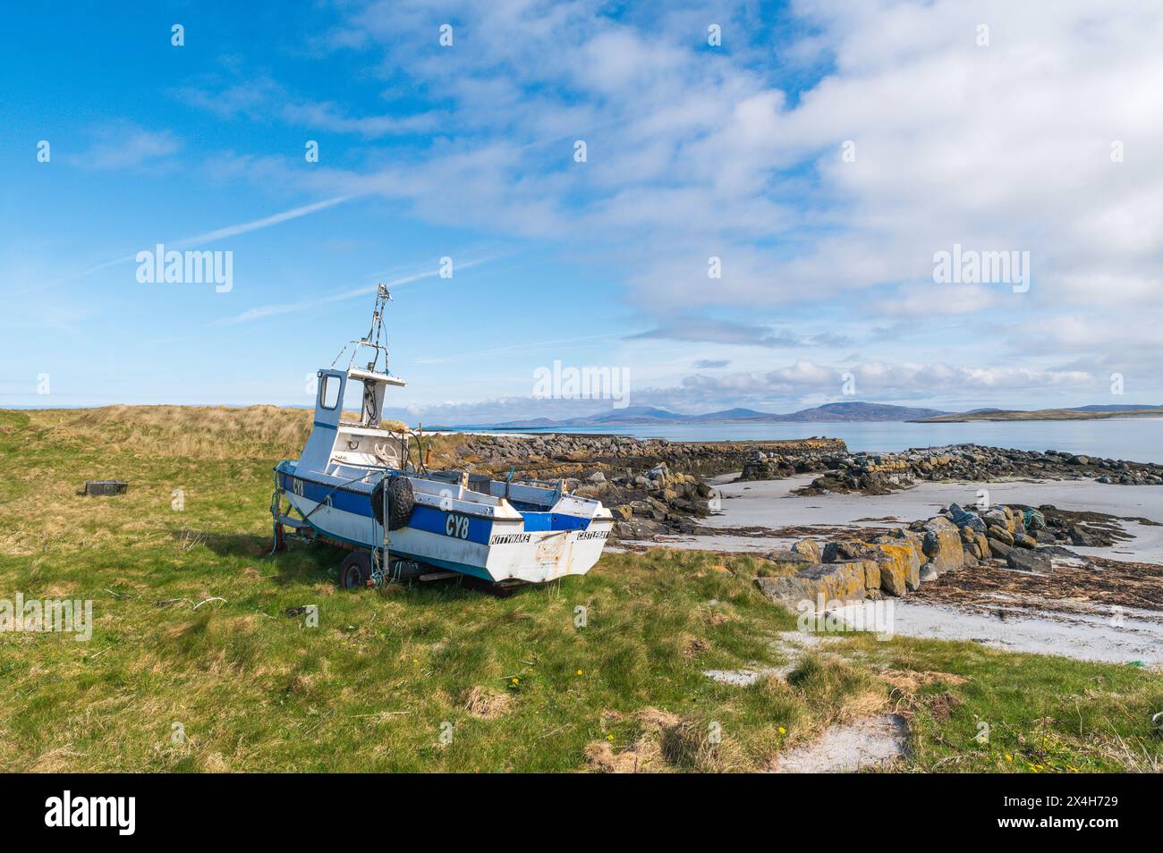 Eoligarry harbour and jetty on The Outer Hebridean, Isle of Barra. Stock Photo