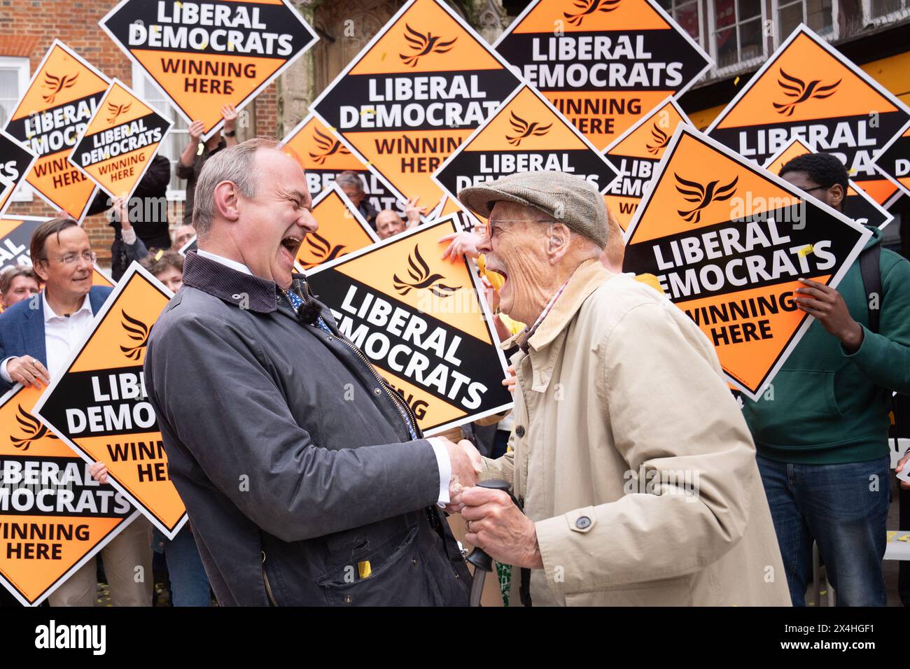 Liberal Democrat leader Sir Ed Davey is greeted by supporters as he arrives to join local Lib Dem campaigners at a celebratory rally in Winchester, following the results in local government elections. Picture date: Friday May 3, 2024. Stock Photo