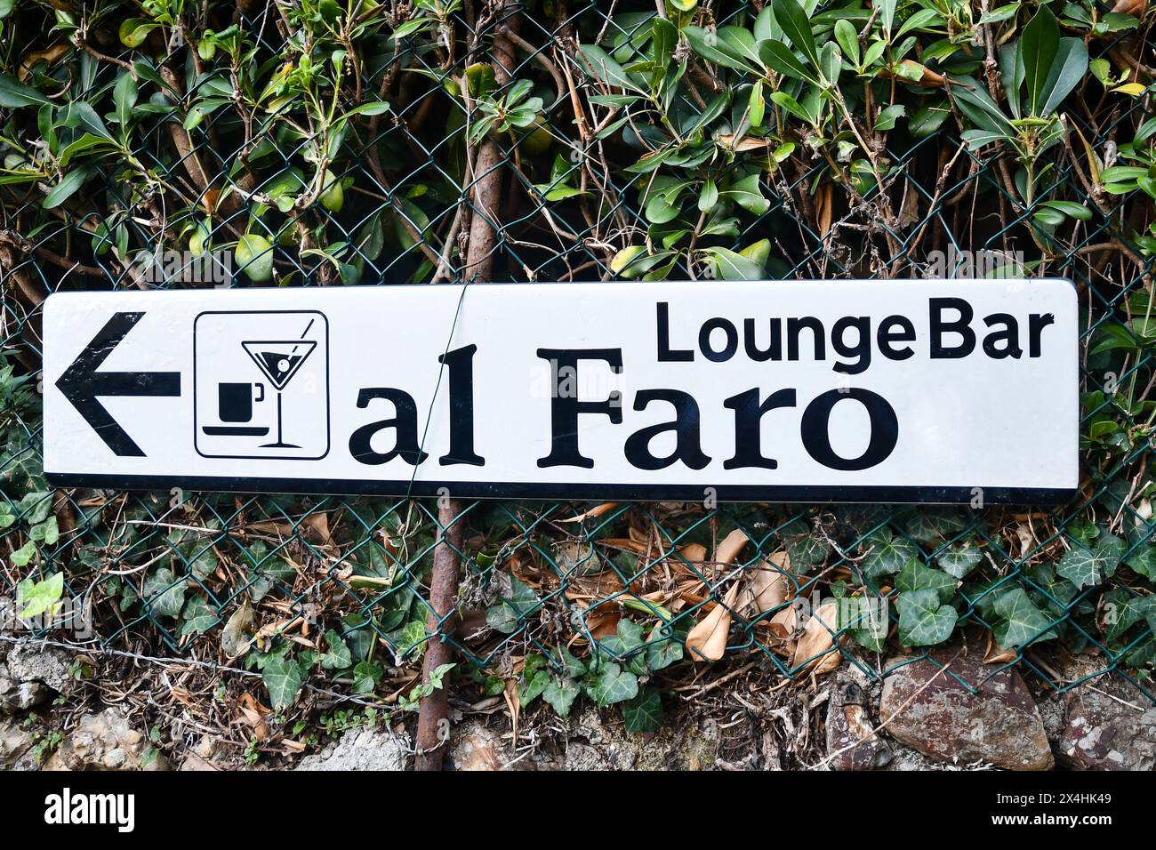 Direction sign to the bar located at the lighthouse on the cape of the Portofino Promontory, Portofino, Genoa, Liguria, Italy Stock Photo