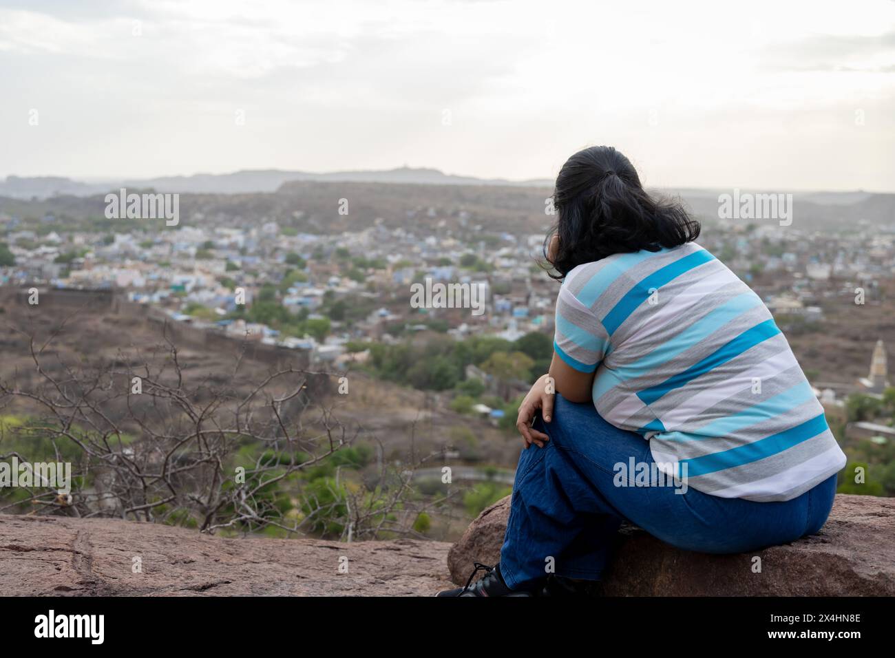 Isolated girl at mountain top hi-res stock photography and images - Alamy