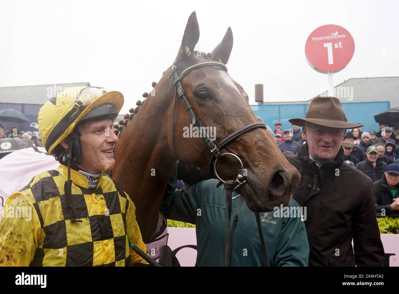 State Man with Paul Townend and trainer Willie Mullins after winning the Boodles Champion Hurdle during day four of the Punchestown Festival at Punchestown Racecourse, County Kildare. Picture date: Friday May 3, 2024. Stock Photo