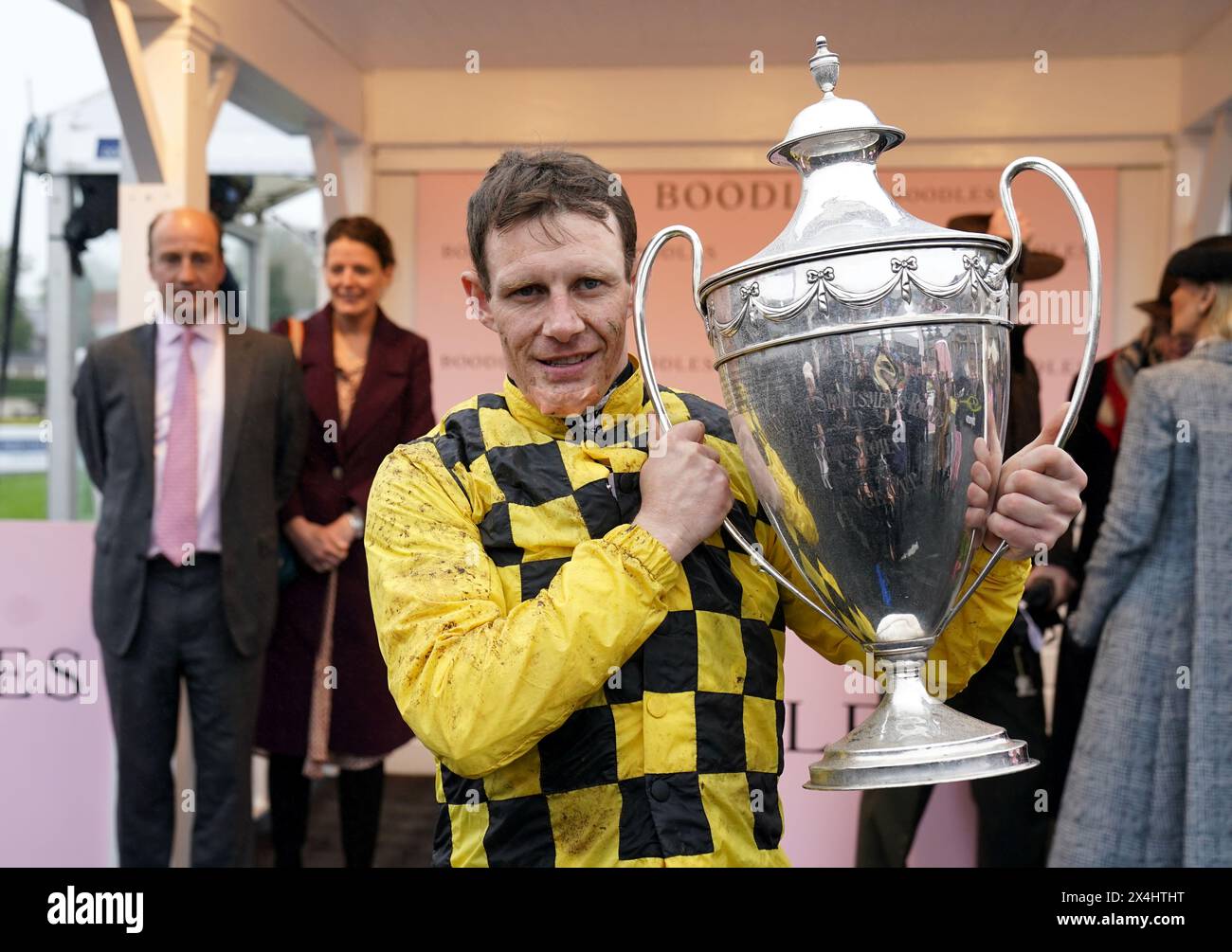 Jockey Paul Townend celebrates with the trophy after winning the Boodles Champion Hurdle on State Man during day four of the Punchestown Festival at Punchestown Racecourse, County Kildare. Picture date: Friday May 3, 2024. Stock Photo