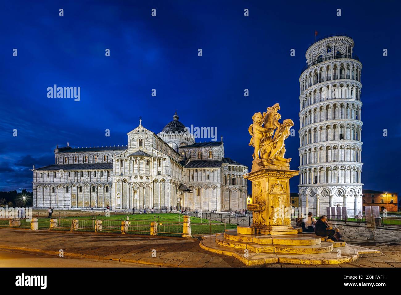 The city of Pisa historic plaza with the Pisa Cathedral, the Leaning Tower and a beautiful sculpture fountain. Photo taken on 22nd of October 2023 in Stock Photo