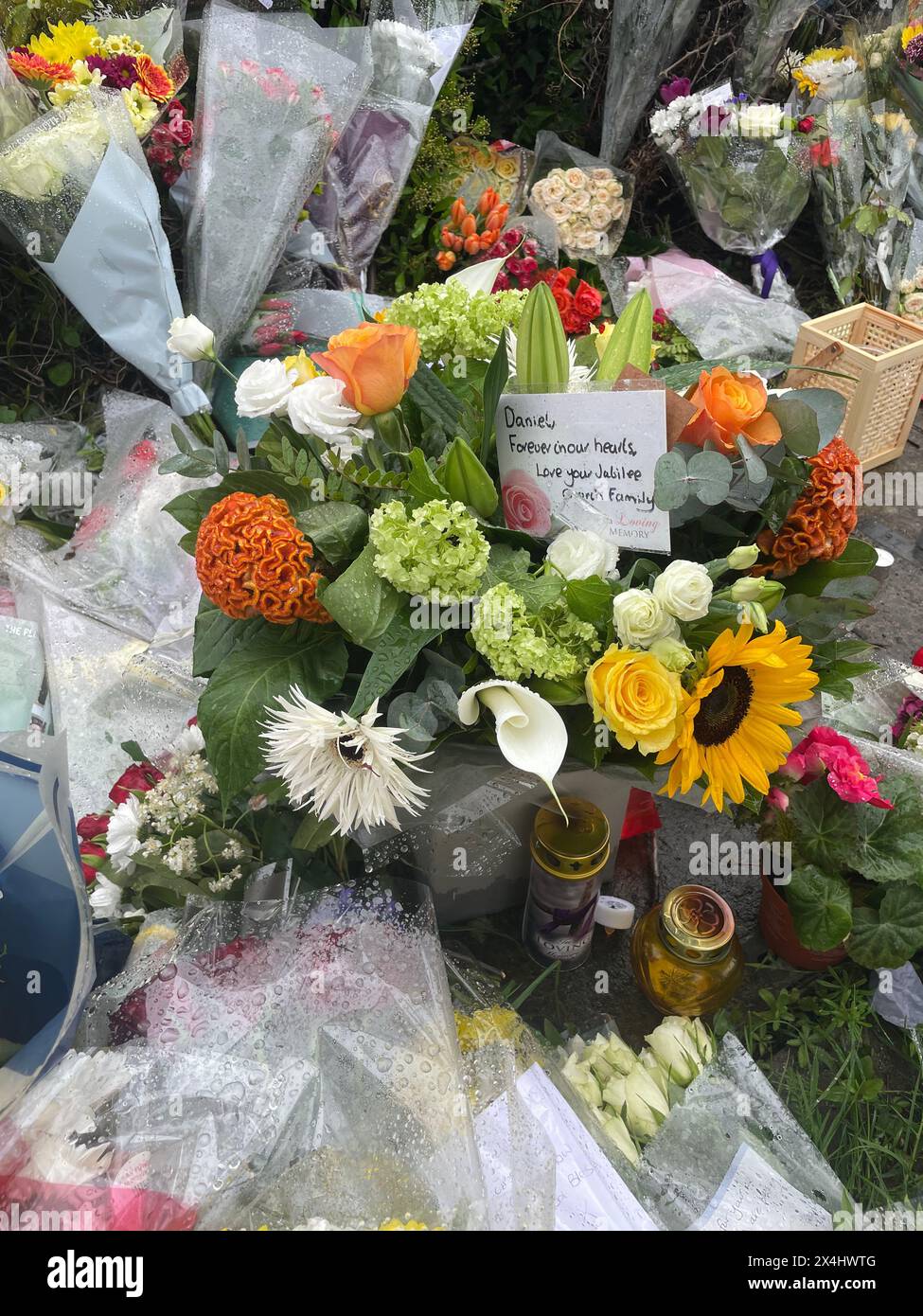 Floral tributes at the end of Laing Close near the scene in Hainault, north east London, where a 14-year-old Daniel Anjorin, was killed in a sword attack on Tuesday, that saw four others injured, including two Metropolitan Police officers. Picture date: Friday May 3, 2024. See PA story POLICE Hainault. Photo credit should read: Samuel Montgomery/PA Wire Stock Photo