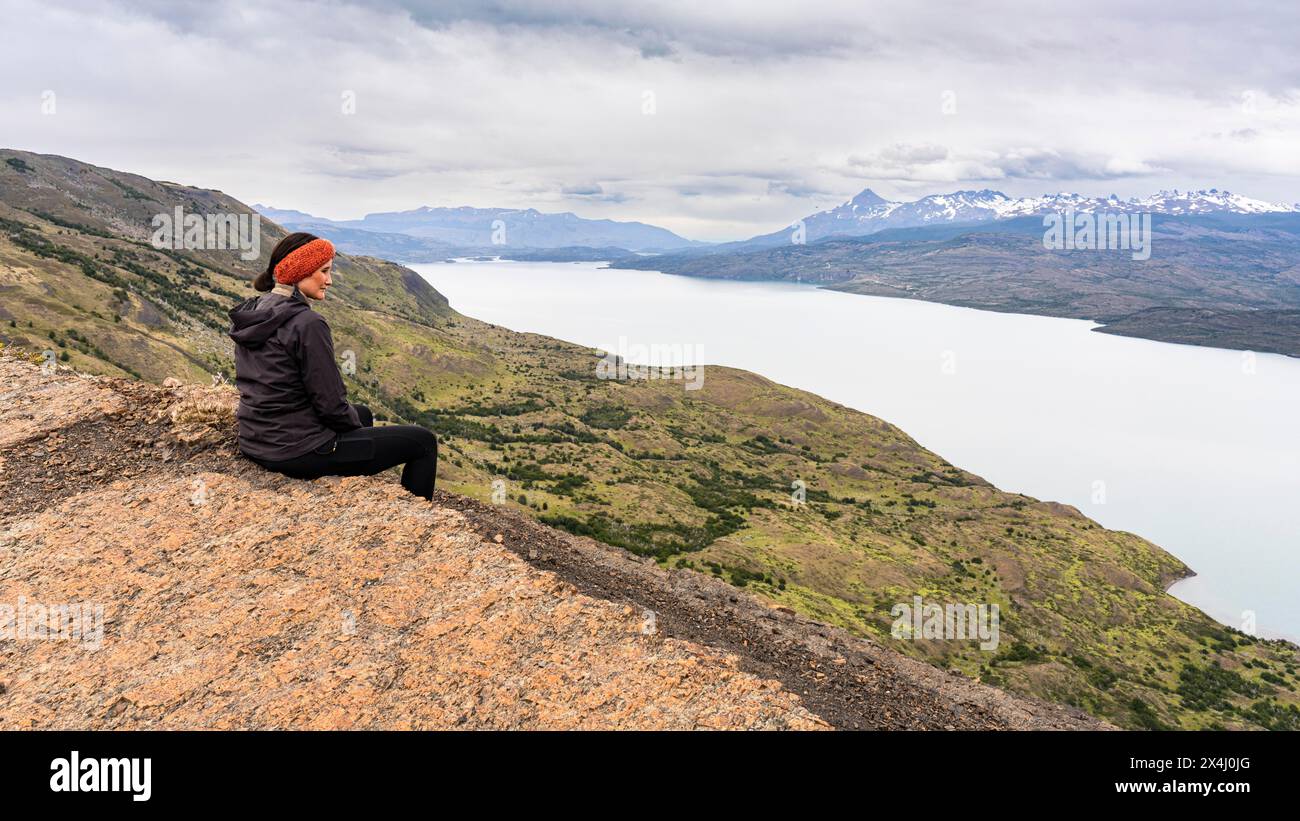 Young woman at Toro lake lookout, Hike to Toro lake lookout, Torres de Paine, Magallanes and Chilean Antarctica, Chile, South America Stock Photo