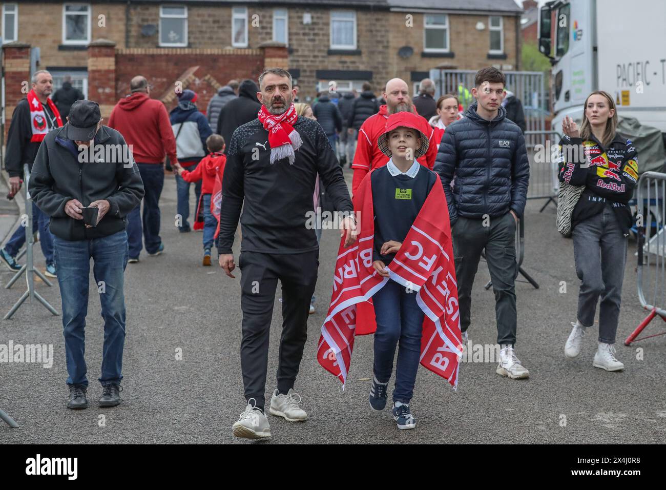 Barnsley fans arrive during the Sky Bet League 1 Sky Bet League 1 Promotion Play-offs Semi-final first leg match Barnsley vs Bolton Wanderers at Oakwell, Barnsley, United Kingdom, 3rd May 2024  (Photo by Alfie Cosgrove/News Images) Stock Photo