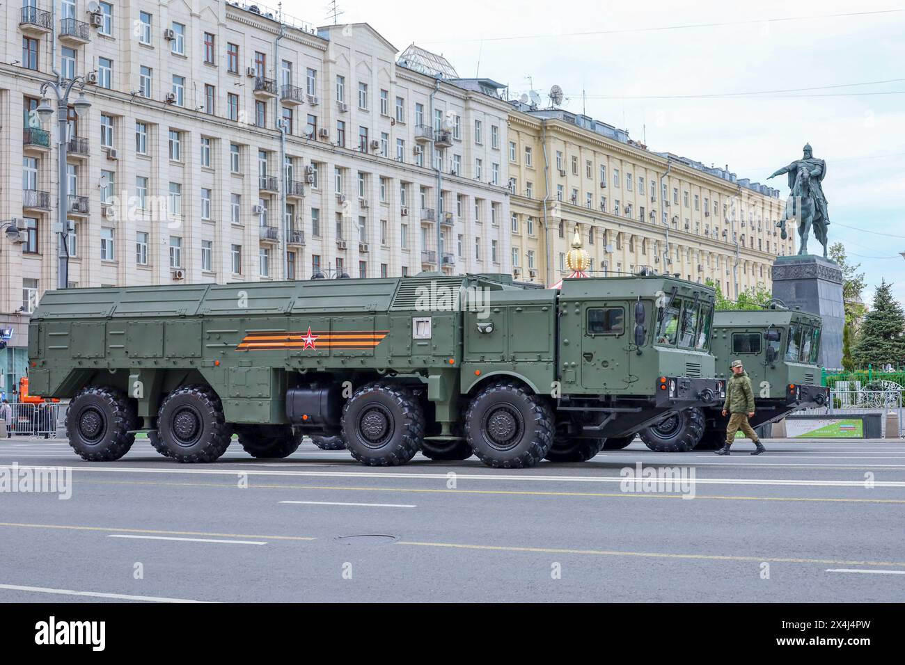 Self-propelled launcher of the Iskander-M missile system, russian military forces on city street near the monument to Yuri Dolgoruky Stock Photo