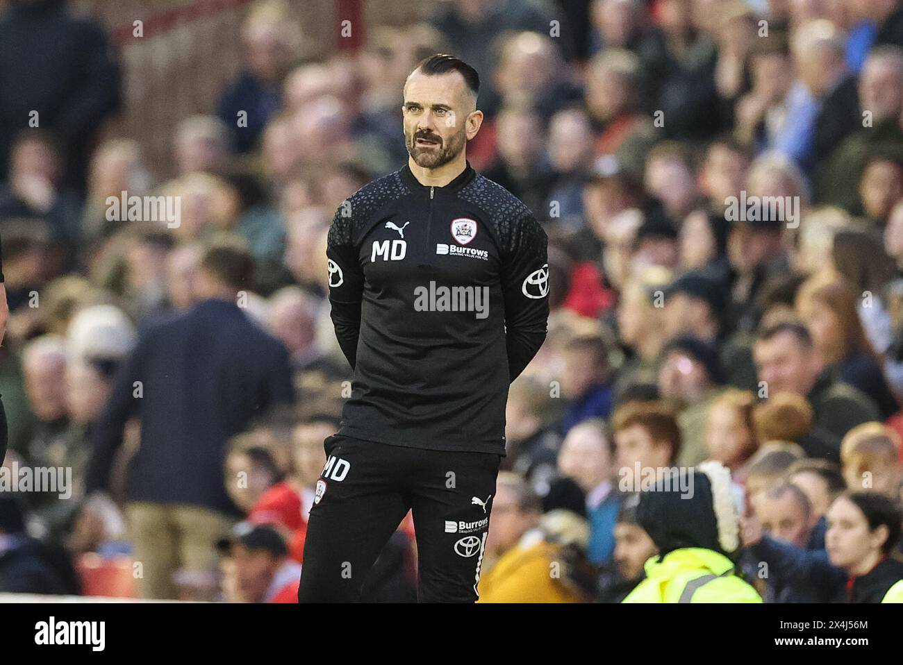 Martin Devaney caretaker manager of Barnsley looks on during the Sky Bet League 1 Promotion Play-offs Semi-final first leg match Barnsley vs Bolton Wanderers at Oakwell, Barnsley, United Kingdom, 3rd May 2024  (Photo by Mark Cosgrove/News Images) Stock Photo