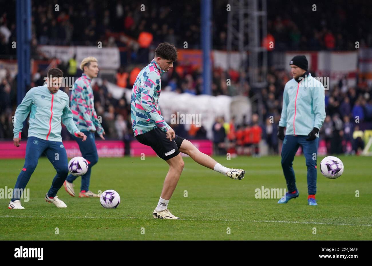 Luton Town's Joe Johnson warming up before the Premier League match at Kenilworth Road, London. Picture date: Friday May 3, 2024. Stock Photo