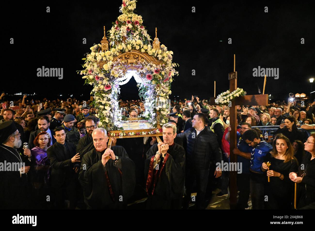 May 3, 2024: Men carry an Epitaph during the procession of Jesus' funeral bier, ''Epitaph'' in Greek, at Aristotelous Square. (Credit Image: © Giannis Papanikos/ZUMA Press Wire) EDITORIAL USAGE ONLY! Not for Commercial USAGE! Credit: ZUMA Press, Inc./Alamy Live News Stock Photo