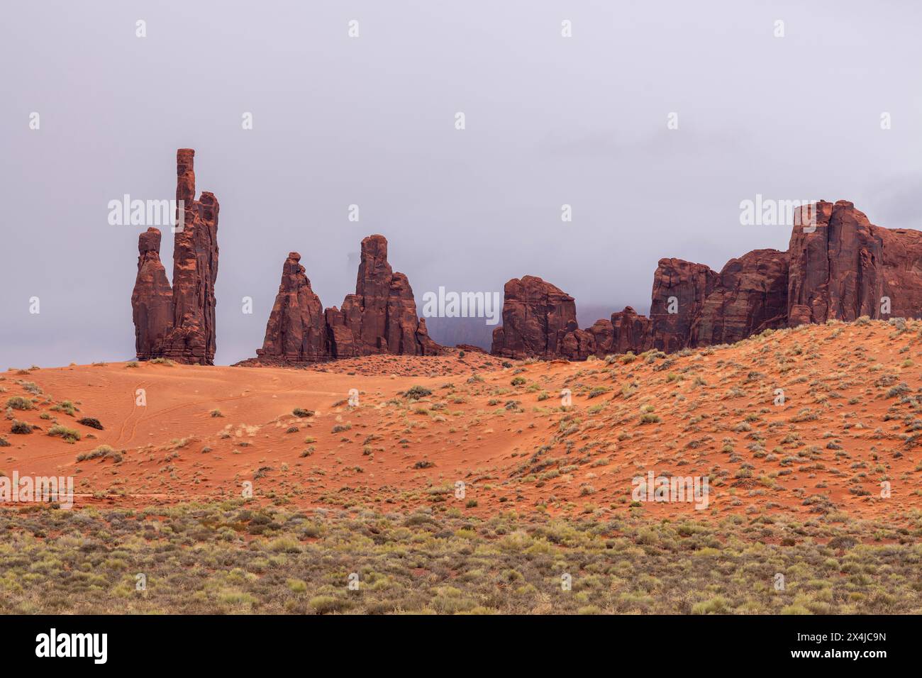 Many areas within Monument Valley show significant consequences of erosion as much of the rock is soft sandstone. Stock Photo
