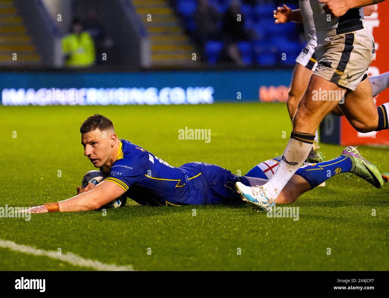 Warrington Wolves' George Williams scores a try during the Betfred Super League match at the Halliwell Jones Stadium, Warrington. Picture date: Friday May 3, 2024. Stock Photo