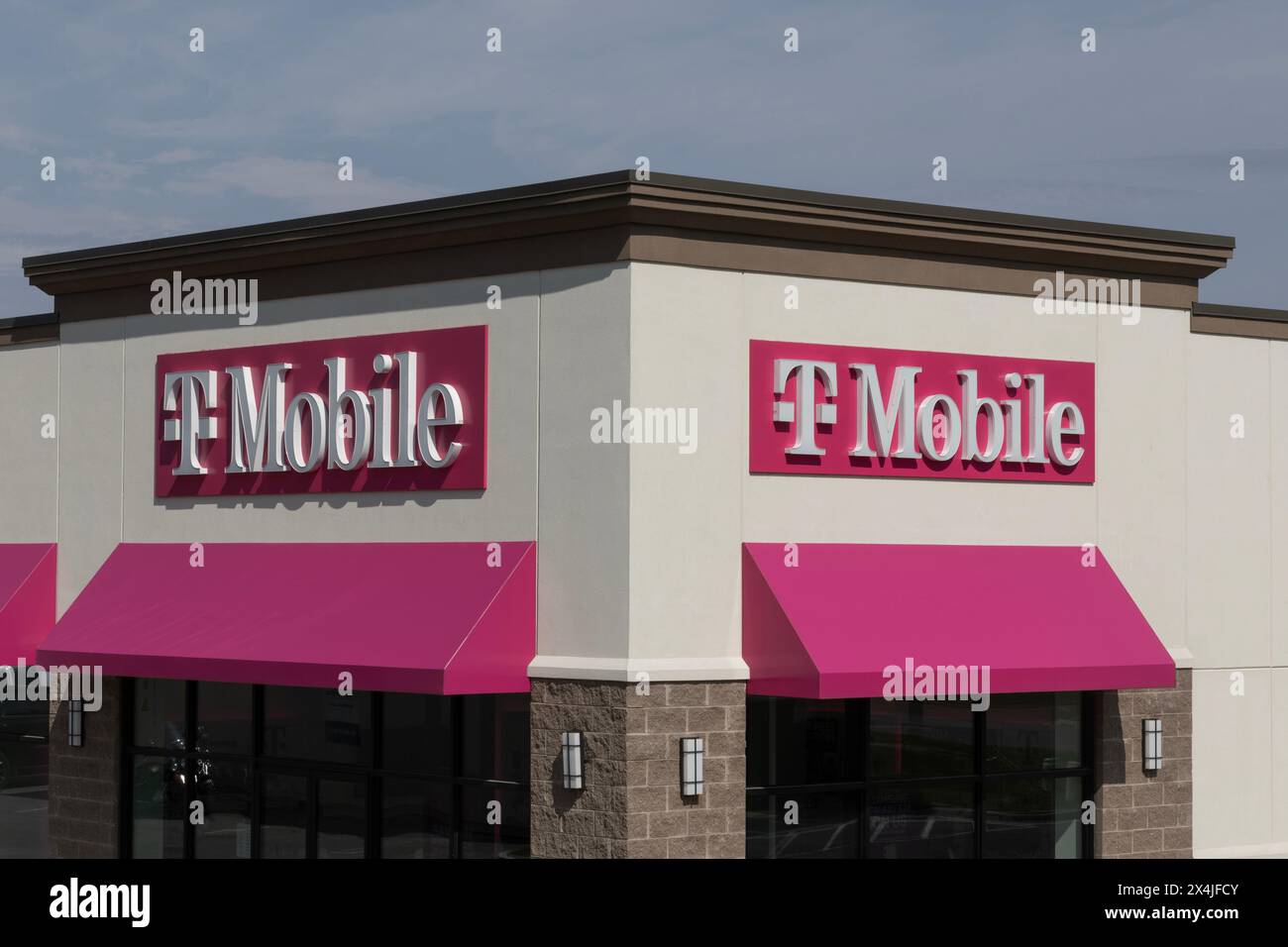 Logansport - May 2, 2024: T-Mobile cell and mobile phone store. T-Mobile offers reliable 5G Home Internet service with its fixed wireless service. Stock Photo