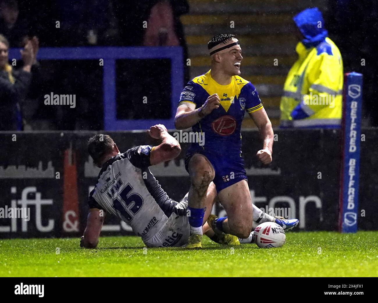 Warrington Wolves' Josh Thewlis celebrates after scoring his side's fourth try of the game and completing his hat-trick during the Betfred Super League match at the Halliwell Jones Stadium, Warrington. Picture date: Friday May 3, 2024. Stock Photo