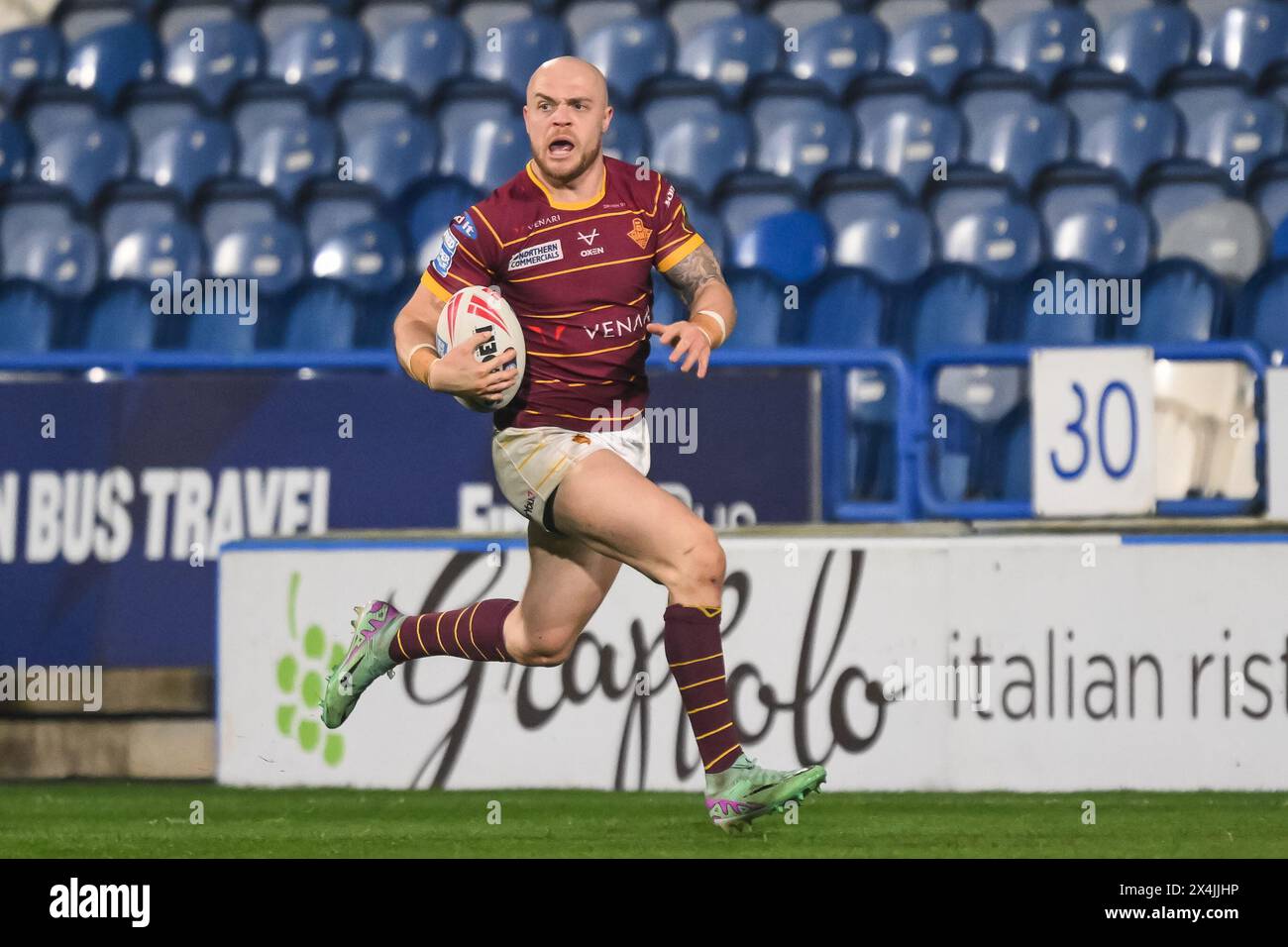 Adam Swift of Huddersfield Giants makes a break during the Betfred Super League Round 10 match Huddersfield Giants vs Salford Red Devils at John Smith's Stadium, Huddersfield, United Kingdom, 3rd May 2024  (Photo by Craig Thomas/News Images) Stock Photo