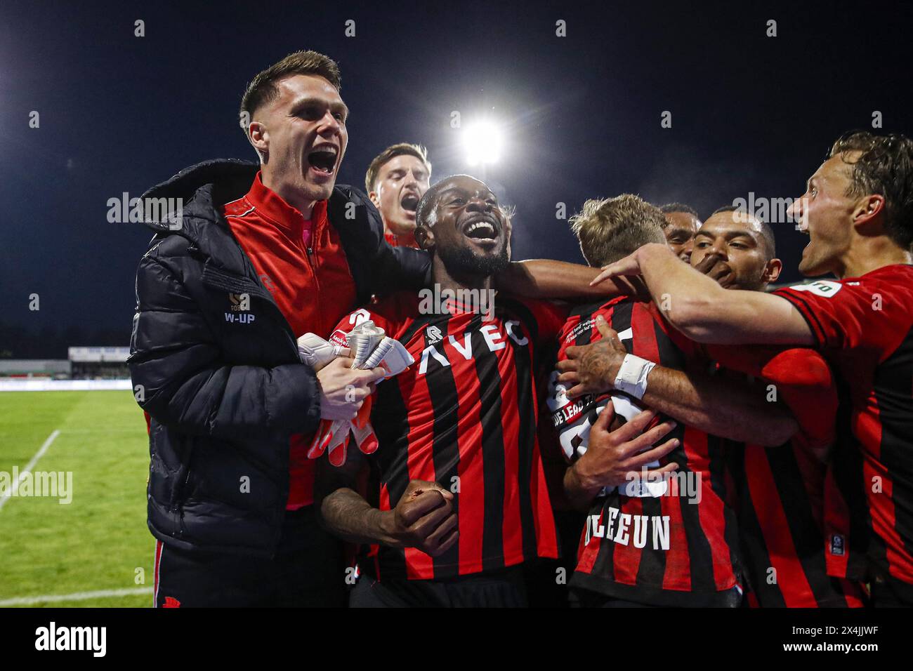 DORDRECHT - Players of Willem II celebrate the promotion to the ...