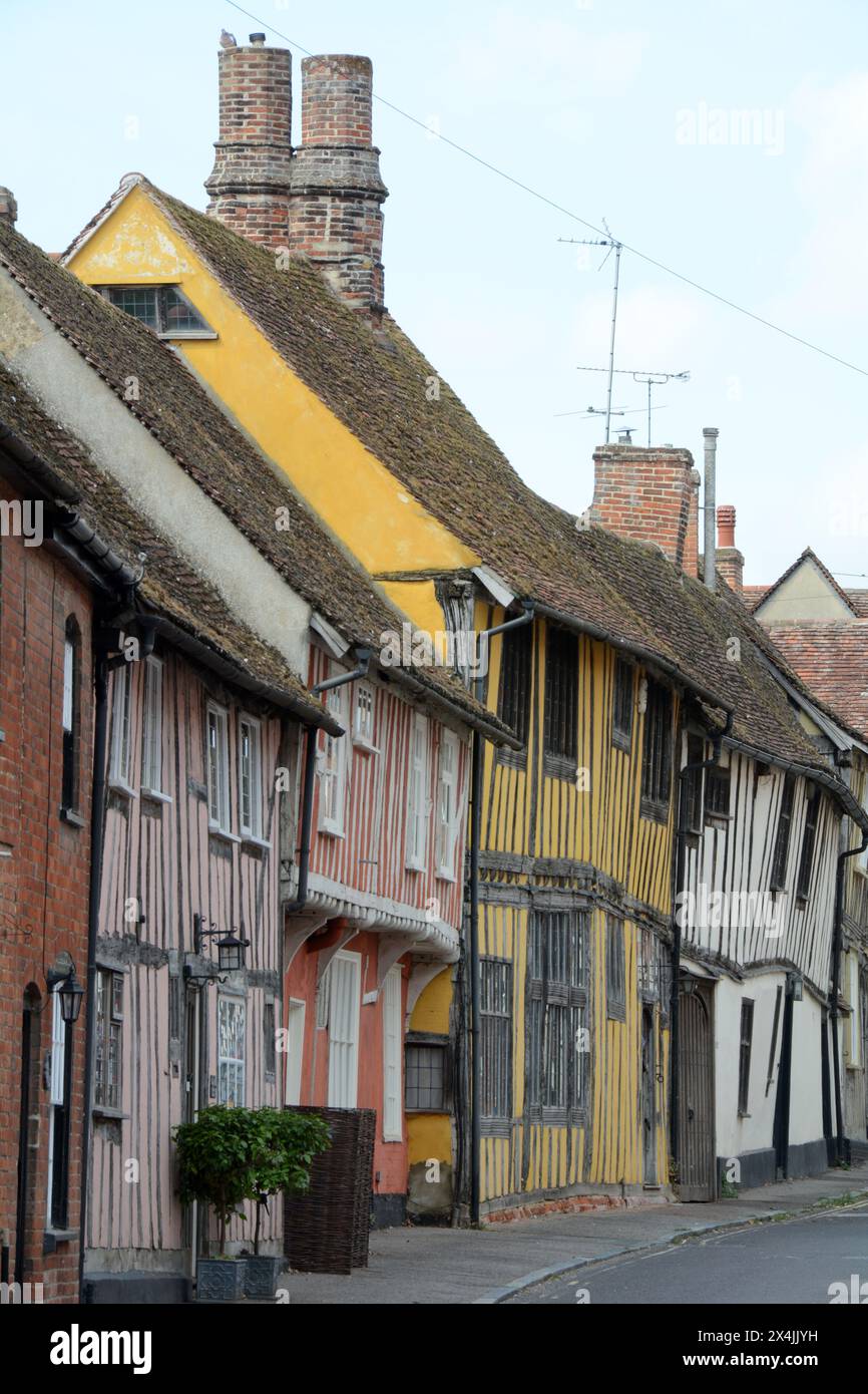 Old medieval half-timbered "crooked houses" in the village of Lavenham in Suffolk county, England, United Kingdom. Stock Photo