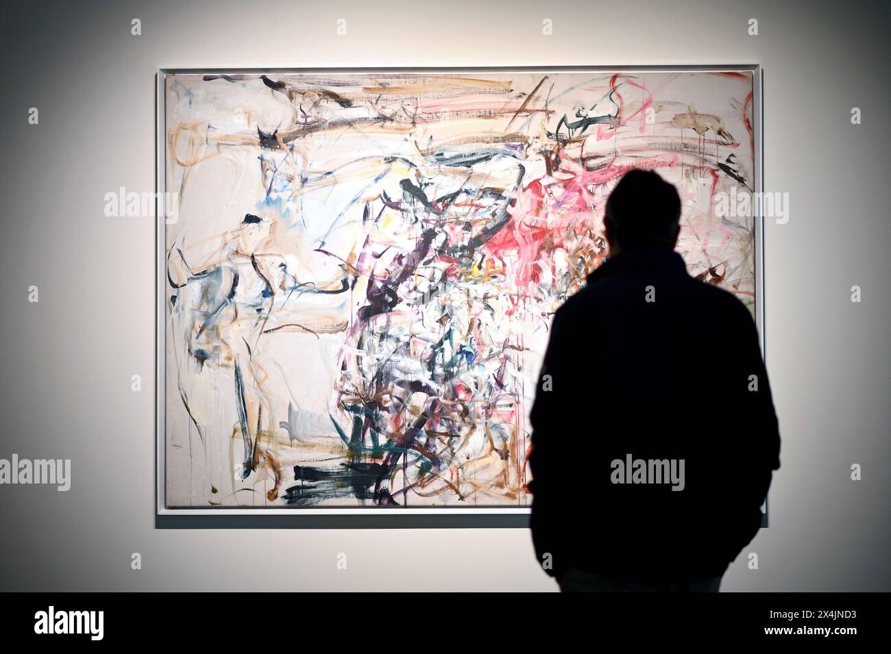 New York, USA. 03rd May, 2024. A visitor stands in front of artist Joan Mitchell's Untitled painting - estimated at $8M to $12M, on opening day of public exhibitions for Sotheby's marquee contemporary and Modern art auctions, New York, NY, May 3, 2024. (Photo by Anthony Behar/Sipa USA) Credit: Sipa USA/Alamy Live News Stock Photo