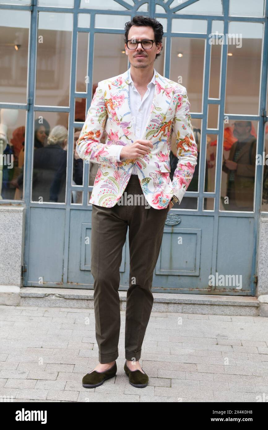 Designer Juan Avellaneda poses during the presentation of the