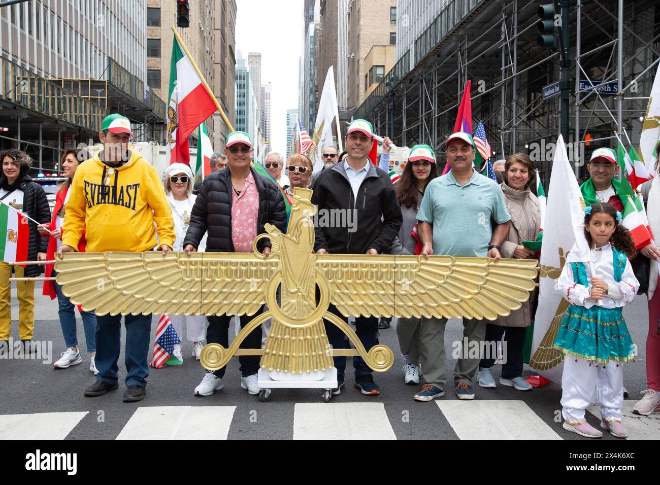 The 20th annual Persian Parade in 2024 on Madison Avenue in New York City. Marching with Zoroastrian symbol Stock Photo