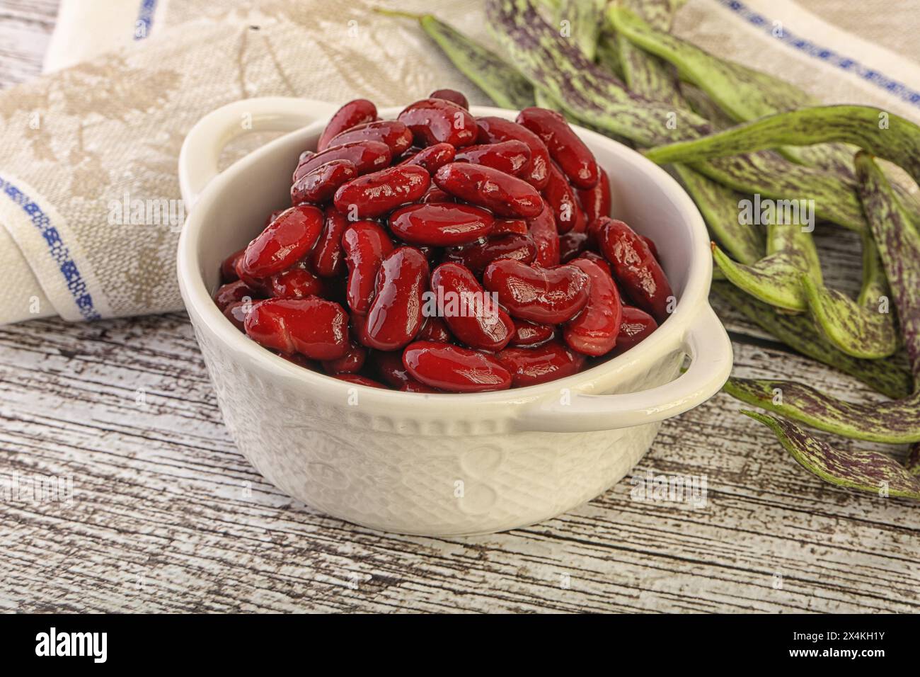 Baked red canned bean snack in the bowl Stock Photo - Alamy