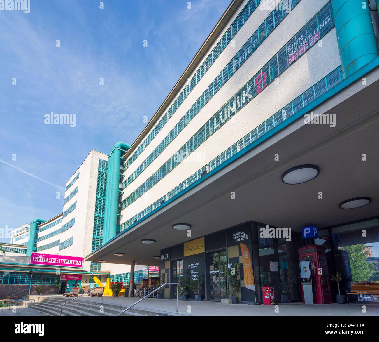 Linz: former Tabakfabrik, today center of the creative industries and digitalization in Donau, Oberösterreich, Upper Austria, Austria Stock Photo