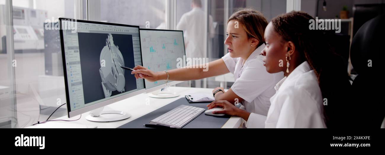 African American Engineer Using 3D Computer for Developing Engineering Software Stock Photo