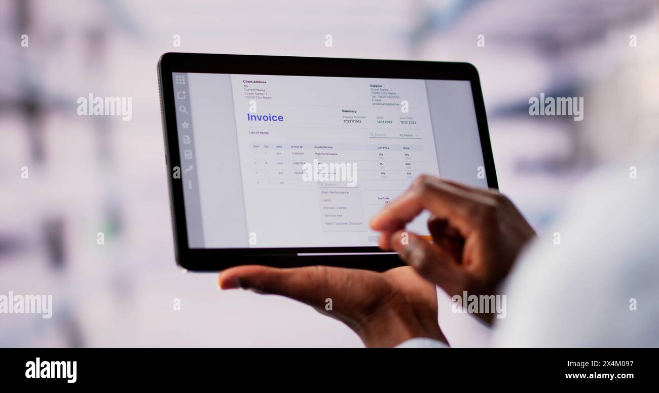 Accountant Checking Online Invoice On Tablet Screen Stock Photo