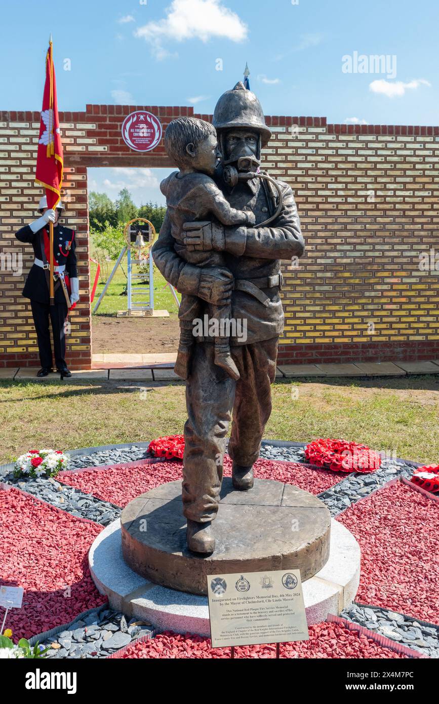 Rettendon, Chelmsford, Essex, UK. 4th May 2024. On International Firefighters' Day a statue, memorial wall & gardens have been opened to honour the bravery & sacrifice of firefighters in the UK. The centrepiece firefighter bronze figure was sculpted by artist Dave Taylor, while the National Red Plaque Firefighter Memorial honours individuals that have served. The site also includes landscaped gardens & a vintage Fire Appliance. The project has been supported by Fire Brigades Union, Essex County Fire & Rescue Service & many businesses & members of the public. Credit: Avpics/Alamy Live News Stock Photo