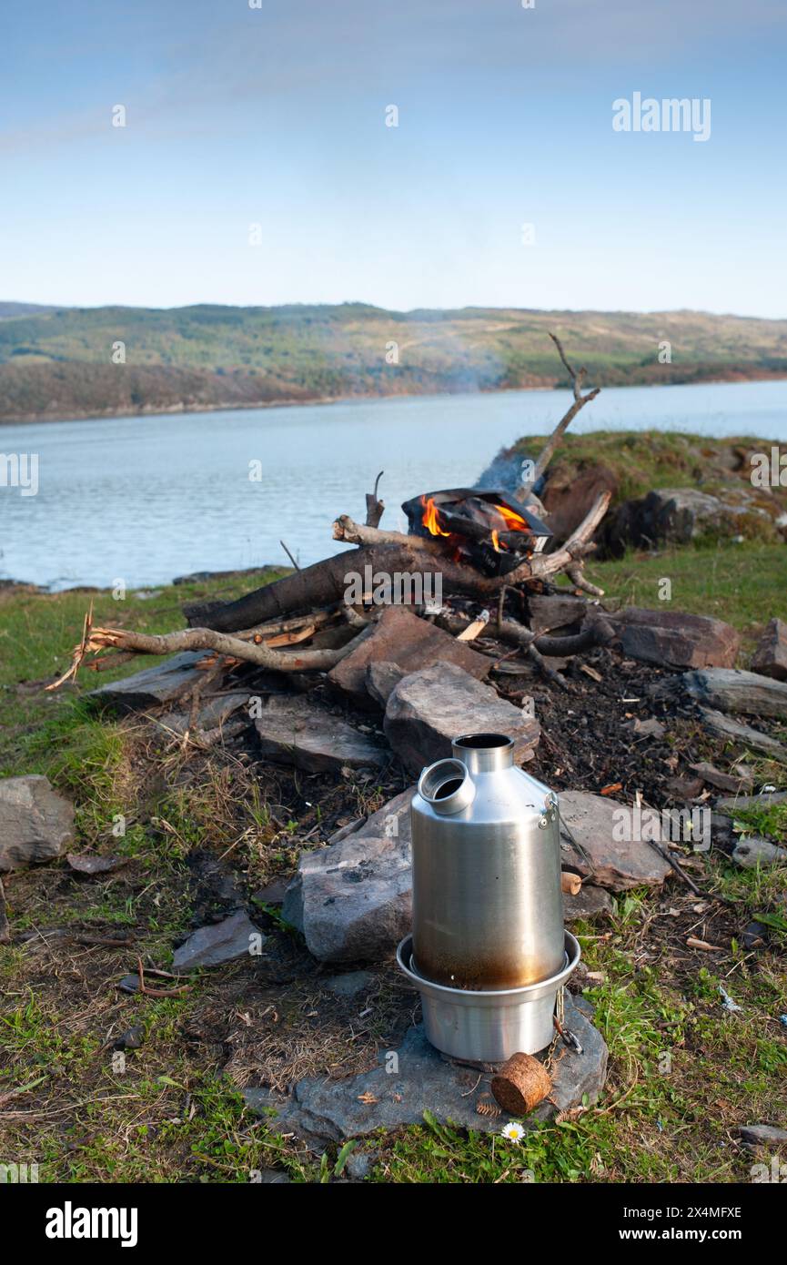 Cooking on a Kelly Kettle or Ghillies Kettle Near Tayvallich, Argyll and Bute, Scotland, United Kingdom Stock Photo