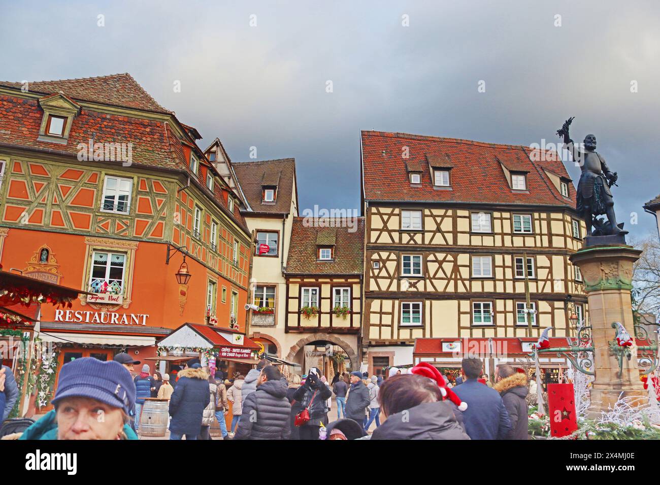 Colmar, France - December 21, 2023: Schwendi fountain by Bartholdi (right) on Old Customs Square Stock Photo