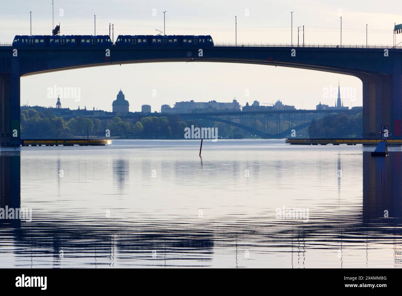 Summer day in Stockholm. Tram over the bridge between Bromma and Essingen in Stockholm Stock Photo