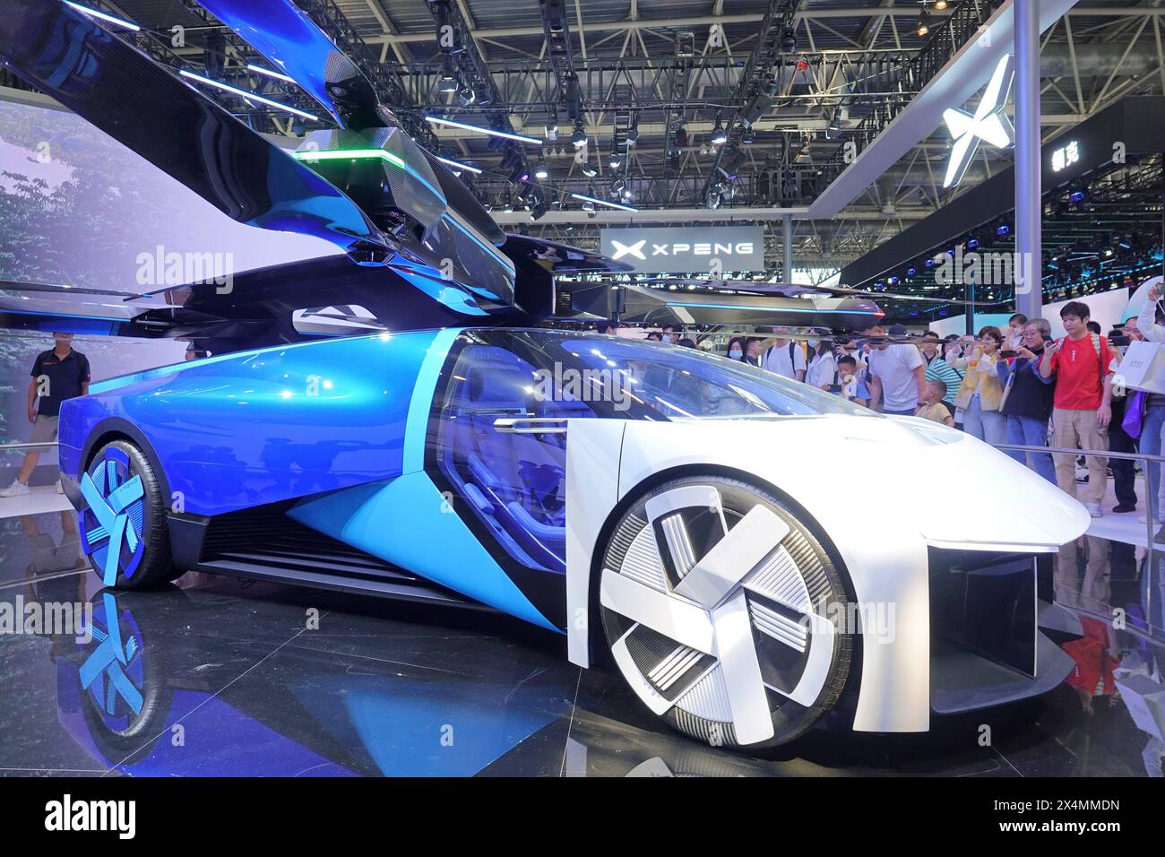 BEIJING, CHINA - MAY 3, 2024 - Visitors watch the Xiaopeng AEROHT Land and Air integrated flying car at the 2024 Beijing International Automotive Exhi Stock Photo