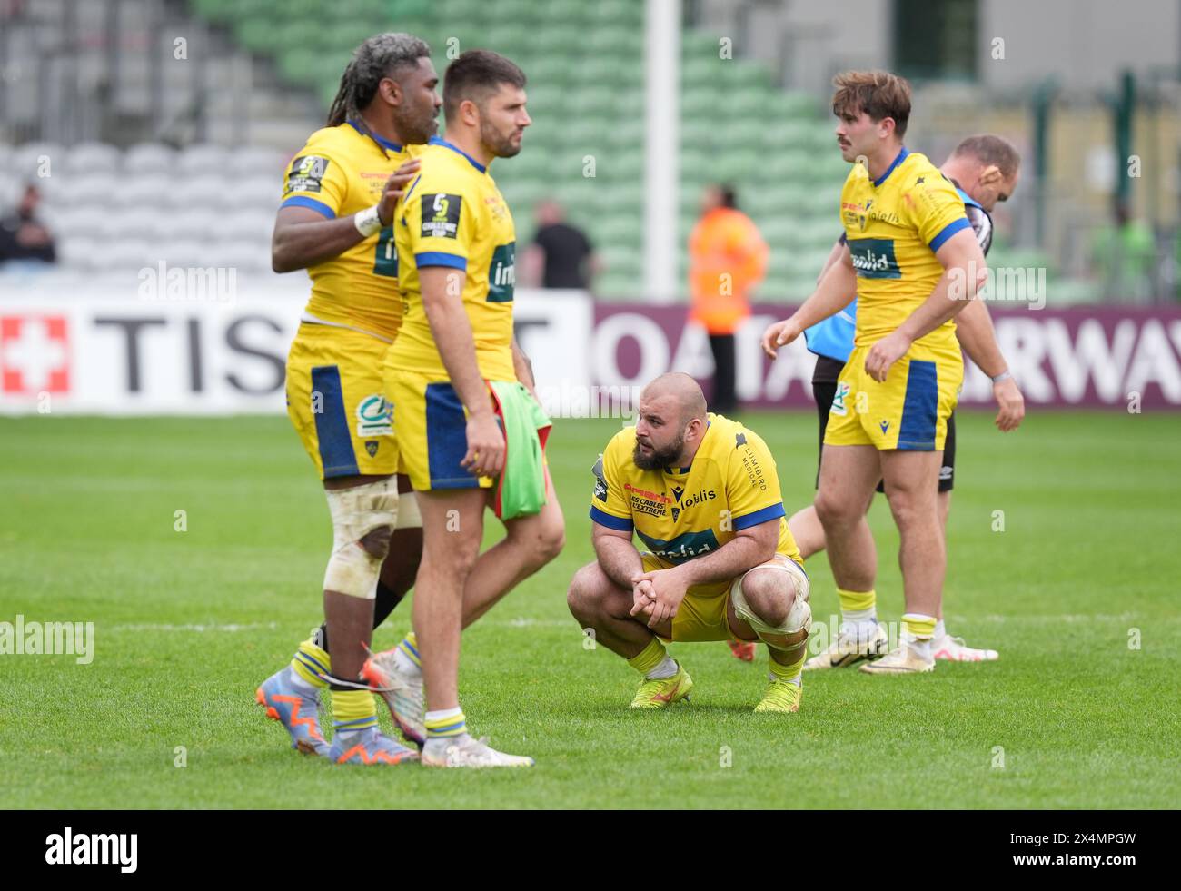 Clermont Auvergne's Beria crouches in dejection following the