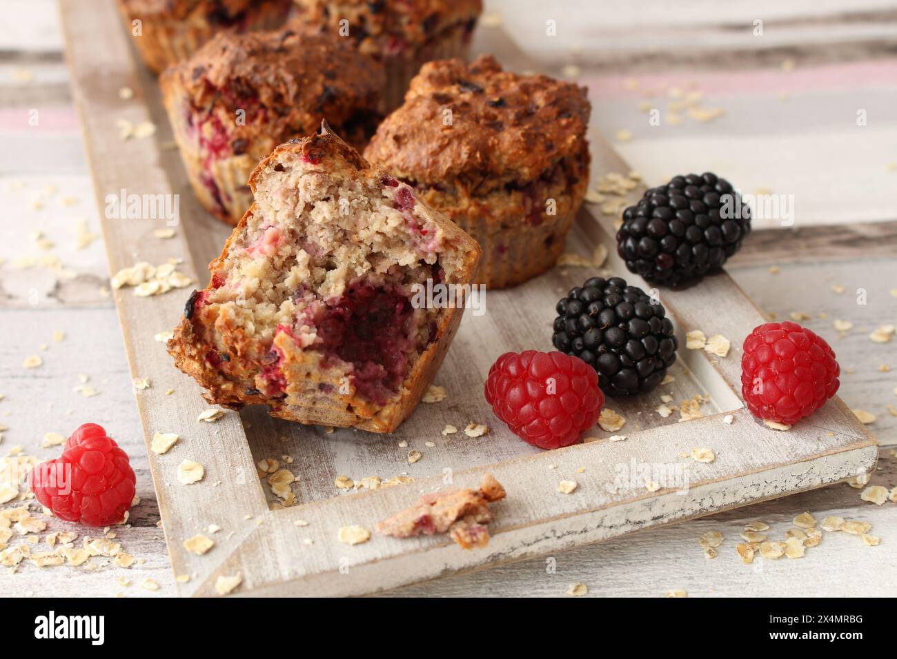 Sugar-Free Baked Oat Breakfast Muffins with Berries Stock Photo