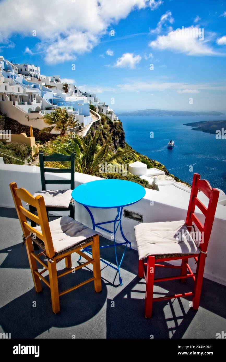 Dine or drink at the caldera cliffs in Santorini, Greece. Stock Photo