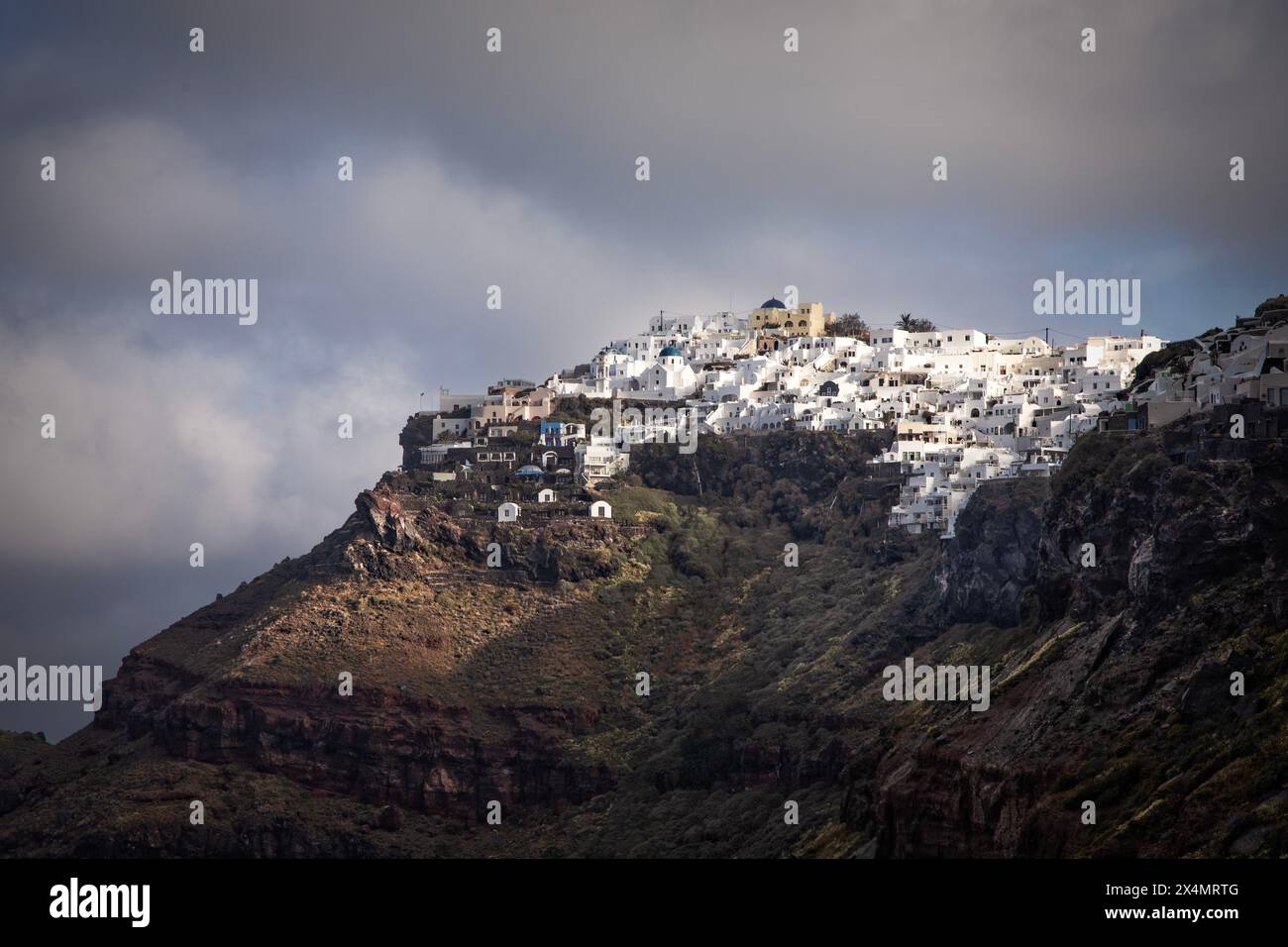 Imerovigli is perched high on the caldera cliffs of Santorini, Greece. Stock Photo