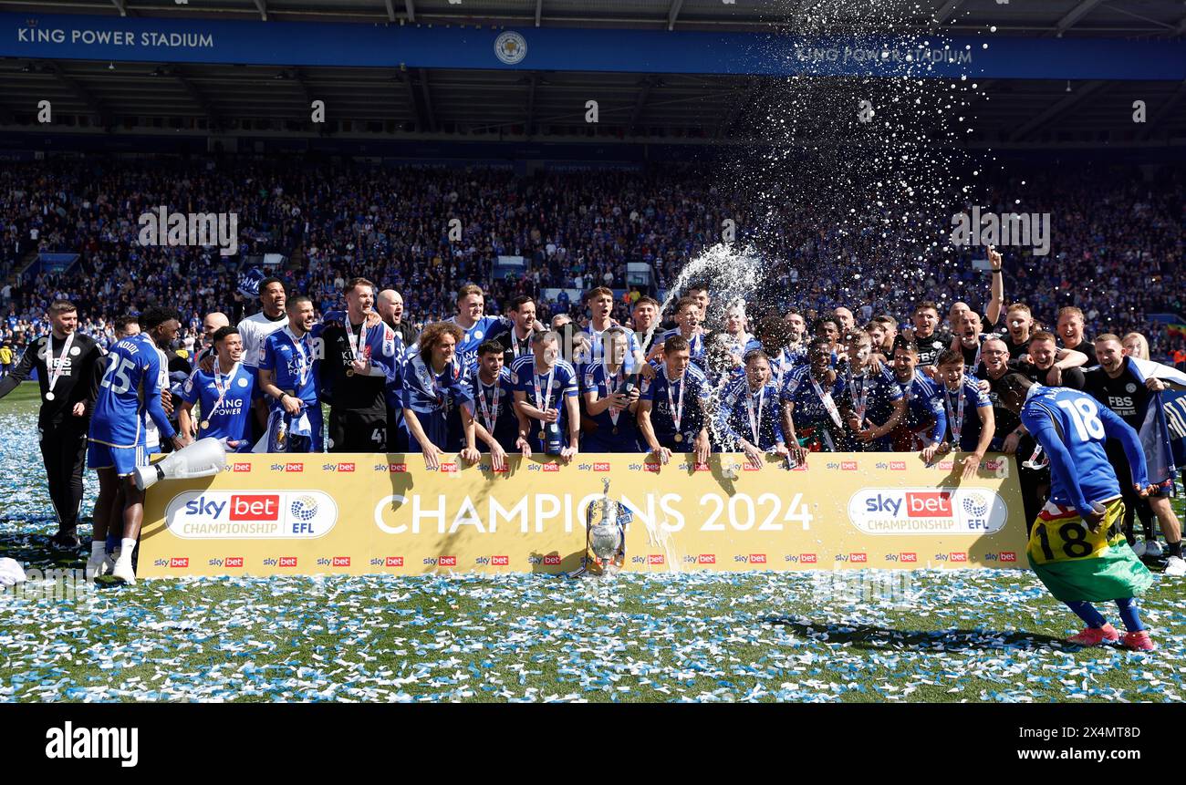 Leicester City players celebrate with the league trophy after the Sky Bet Championship match at the King Power Stadium, Leicester. Picture date: Saturday May 4, 2024. Stock Photo