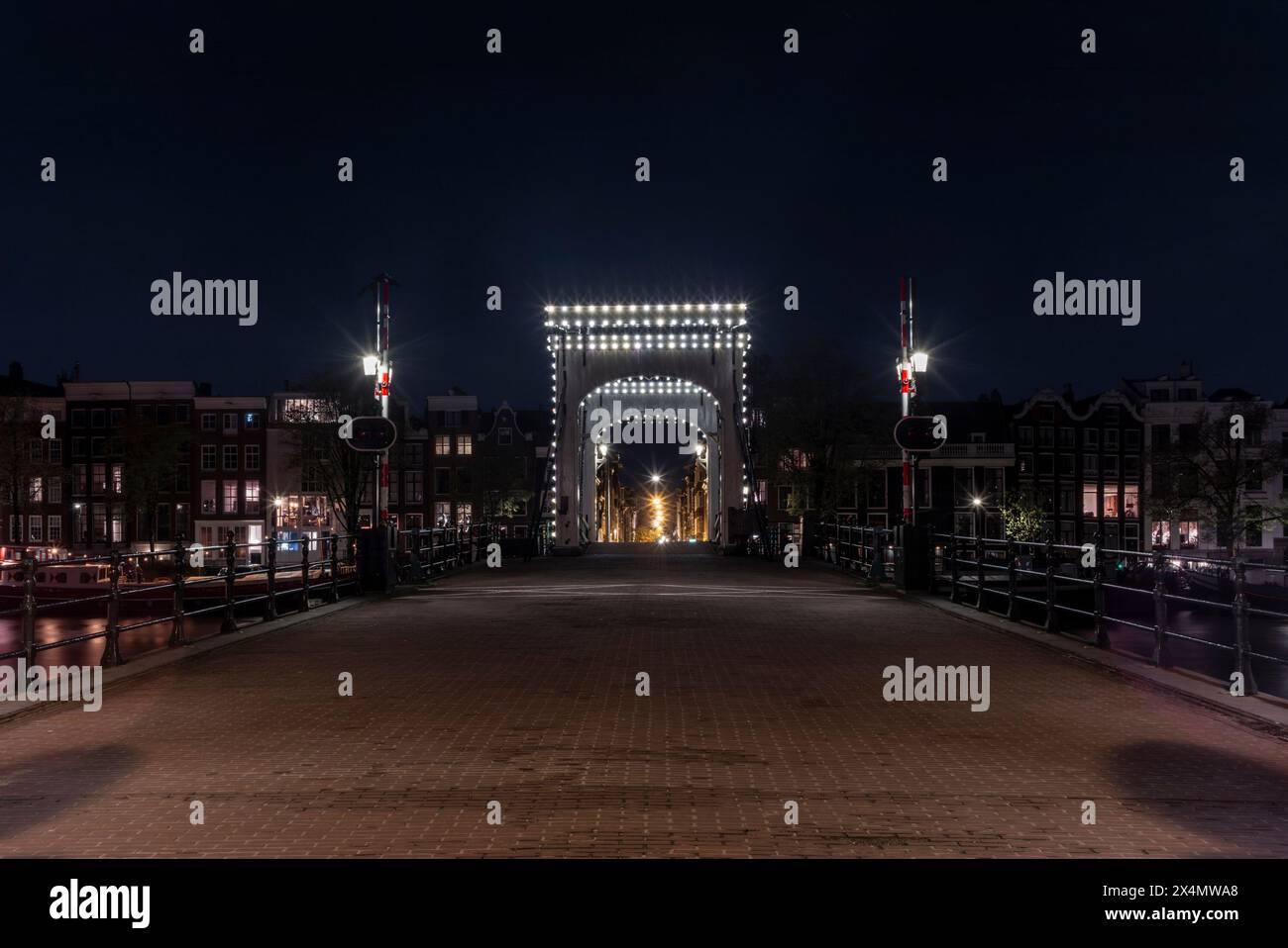 The Magere Brug (Skinny Bridge) in Amsterdam at night completely empty Stock Photo