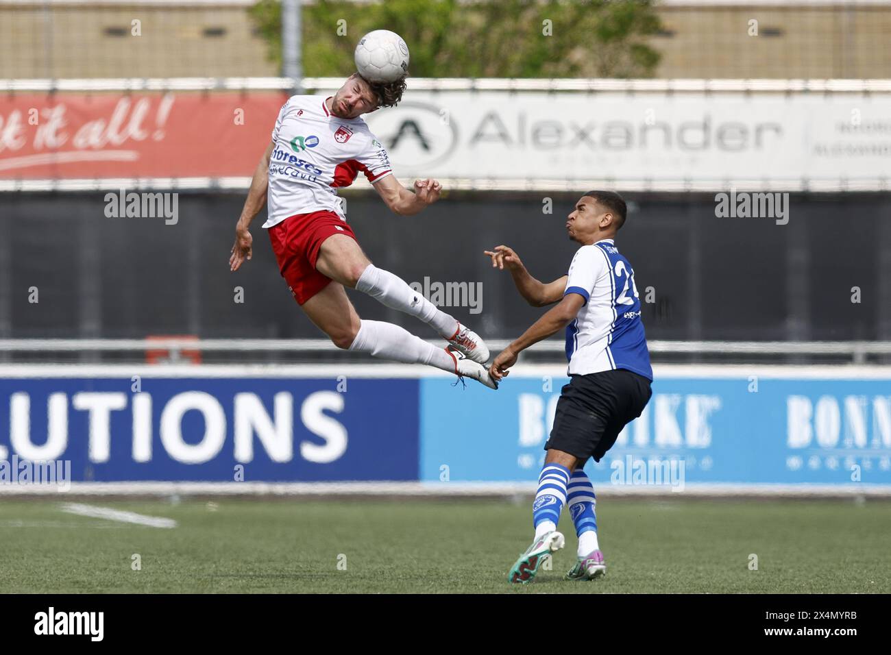 Noordwijk, Netherlands. 04th May, 2024. NOORDWIJK, 04-05-2024, Sportpark Duinwetering, Betnation Dutch Tweede Divisie Football, season 2023/2024, match between Noordwijk and ADO 20. Noordwijk player Oscar Wilffert and ADO 20 player Jilani Helder Credit: Pro Shots/Alamy Live News Stock Photo