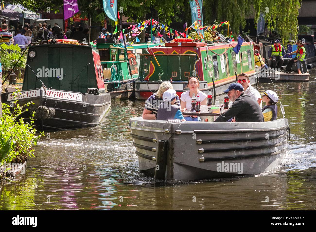 London, UK, 04th May 2024. A pleasure boat passes the lined up
