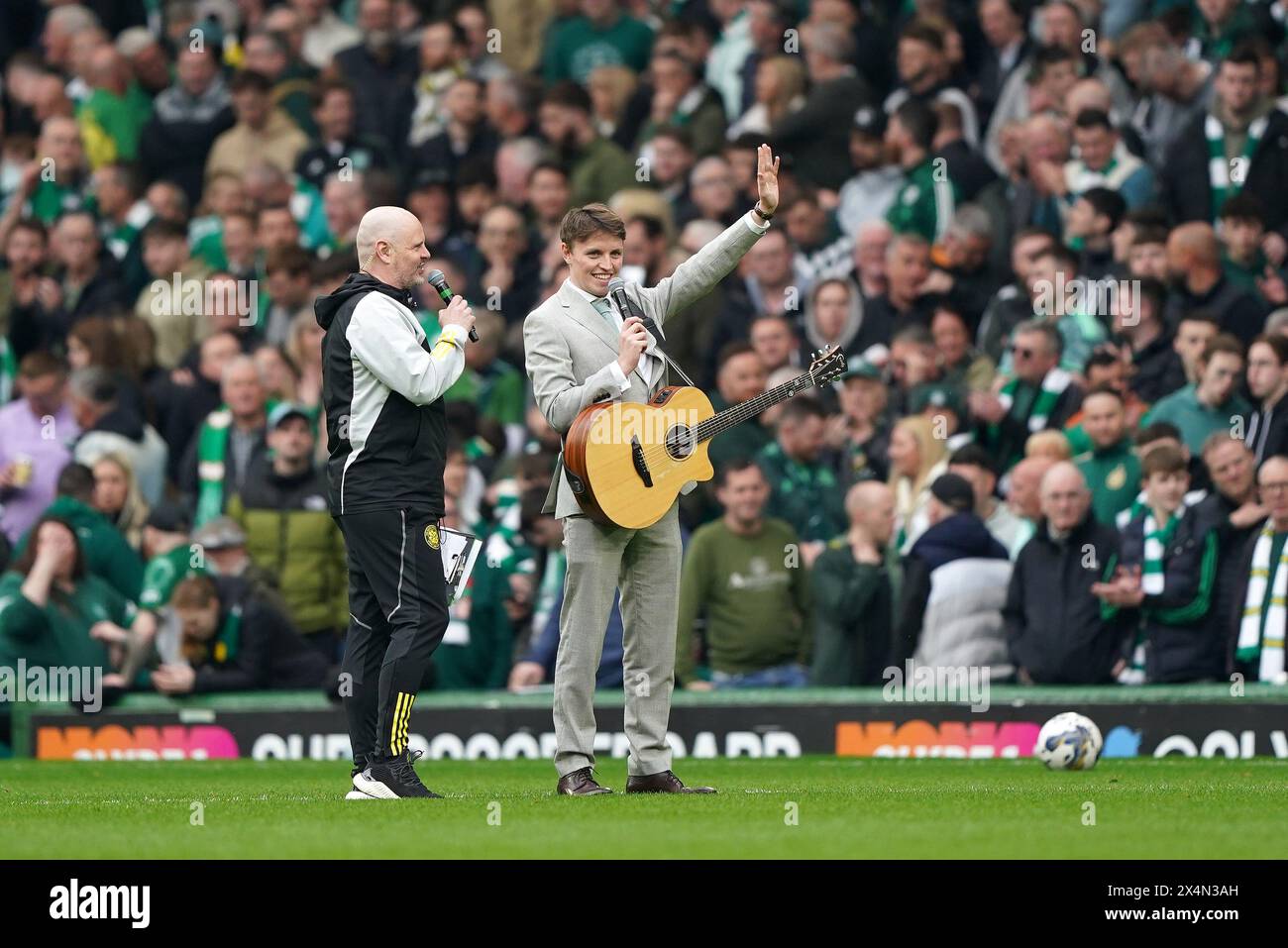 Scottish singer Daniel Rooney (right) playing at half time during the ...