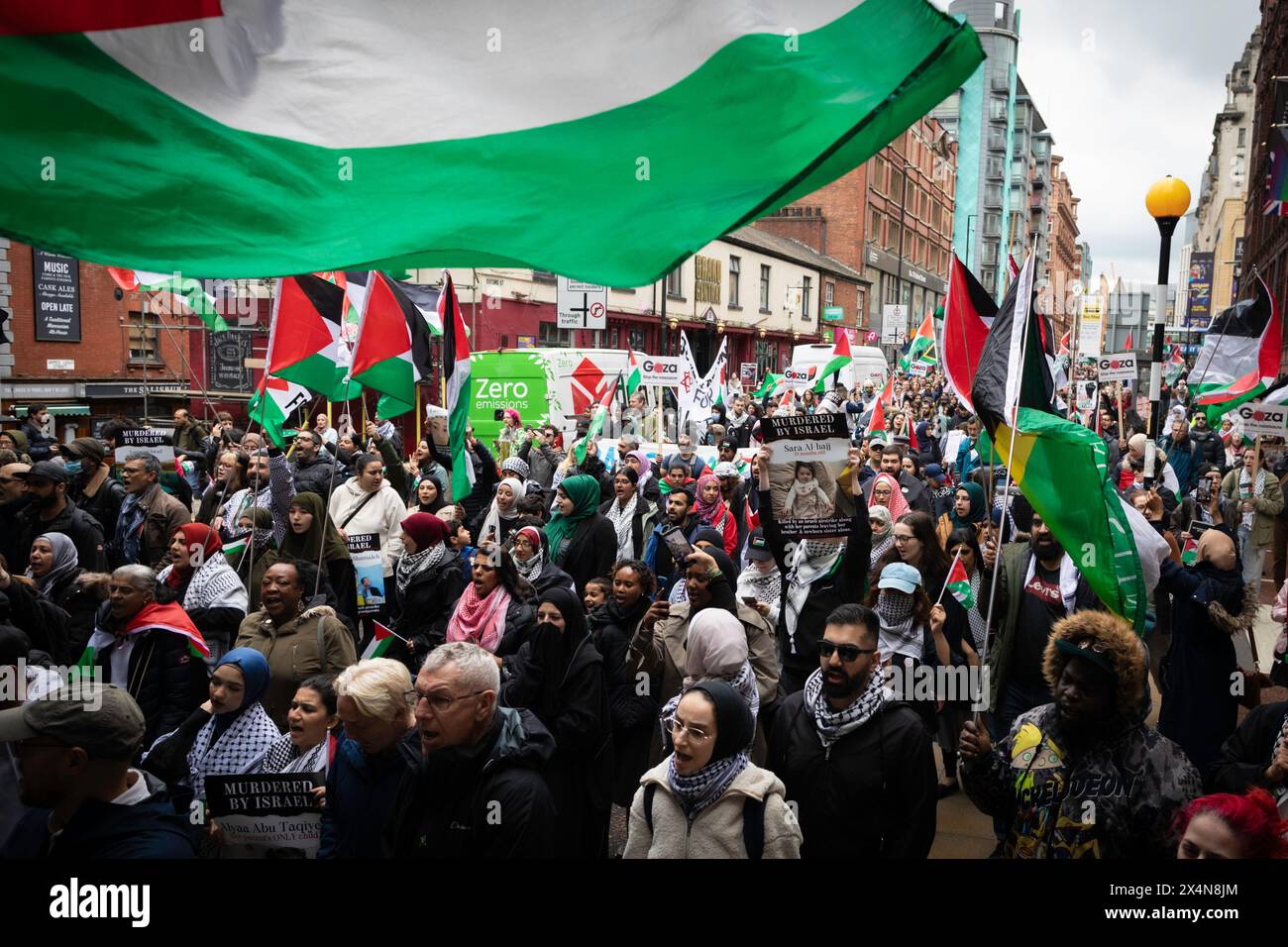 Manchester, UK. 04th May, 2024. Hundreds of pro-Palestine supporters march through the city during the demonstration. Palestine movements joined to raise awareness for all professionals operating in Gaza on the International Workers Day. (Photo by Andy Barton/SOPA Images/Sipa USA) Credit: Sipa USA/Alamy Live News Stock Photo