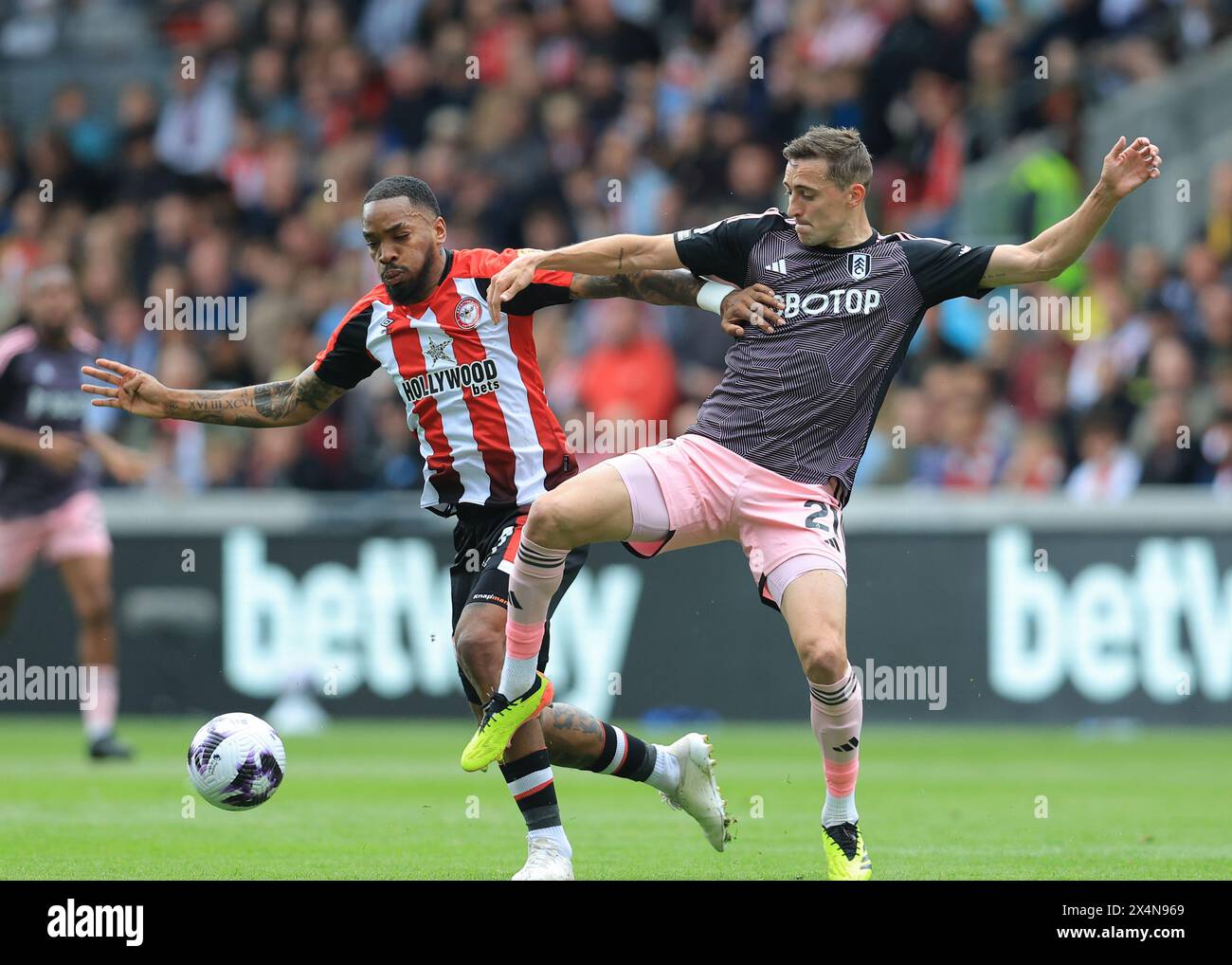 London, UK. 4th May, 2024. Ivan Toney of Brentford and Timothy Castagne of Fulham challenge for the ball during the Premier League match at Gtech Community Stadium, London. Picture credit should read: Paul Terry/Sportimage Credit: Sportimage Ltd/Alamy Live News Stock Photo