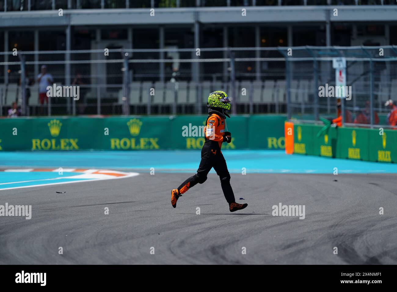 Miami, Florida, USA. 4th May, 2024. 4 McLaren F1 Team, Lando Norris (GBR) runs across the track after crashing on the opening lap of the Sprint Race.at the Formula 1 Crypto.com Miami Grand Prix in Miami, Florida. Max Verstappen won the race. (Credit Image: © Richard Dole/ZUMA Press Wire) EDITORIAL USAGE ONLY! Not for Commercial USAGE! Stock Photo